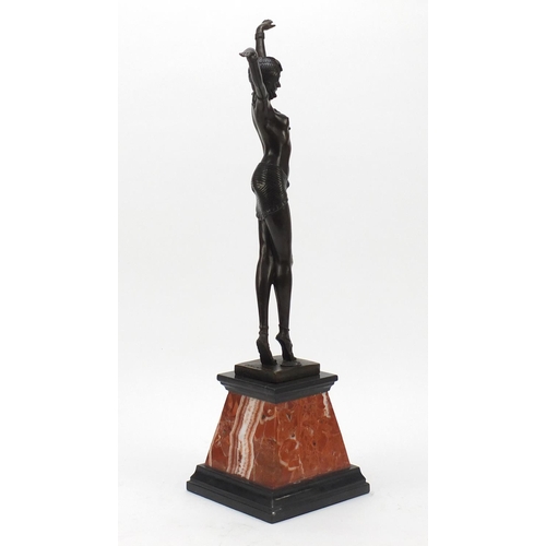 194 - Large patinated bronze figure of a scantily dressed Art Deco female raised on a tapering marble base... 