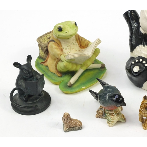 1167 - Collectable china including Beswick owls, Royal Doulton Winnie the Pooh and Wade Whimsies, the large... 