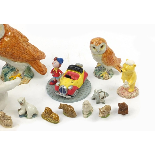 1167 - Collectable china including Beswick owls, Royal Doulton Winnie the Pooh and Wade Whimsies, the large... 