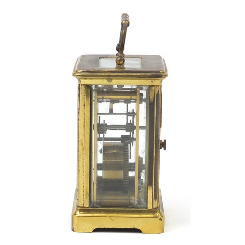 301 - French brass cased carriage clock with Arabic numerals, 14cm high