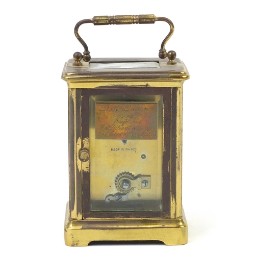 301 - French brass cased carriage clock with Arabic numerals, 14cm high