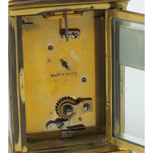 301 - French brass cased carriage clock with Arabic numerals, 14cm high