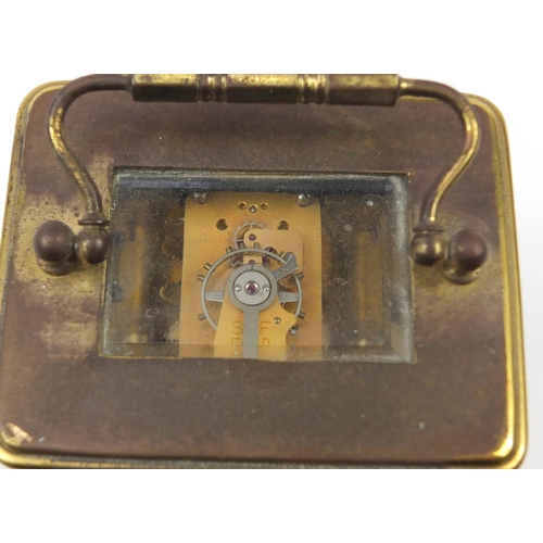 301 - French brass cased carriage clock with Arabic numerals, 14cm high