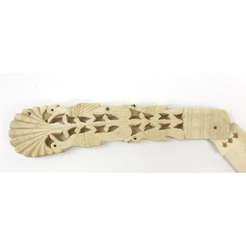 415 - Scrimshaw style bone folding knife, carved with birds in a bush, 20cm in length