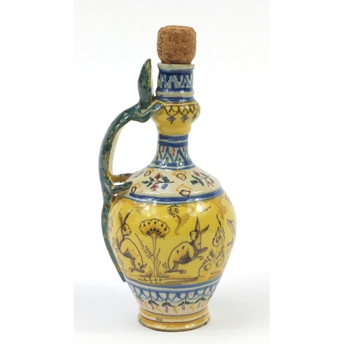 345 - 19th century maiolica ewer hand painted with animals and figures, 25cm high