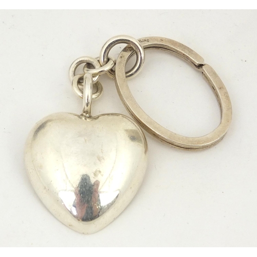 764 - Mappin & Webb, silver heart shaped keyring, Sheffield 2004, 8cm in length, 52.9g