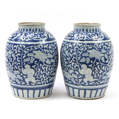 122 - Large pair of Chinese blue and white porcelain vases hand painted with children amongst flowers, eac... 