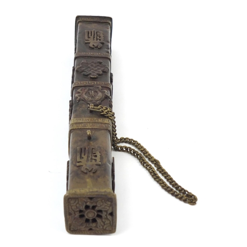 617 - Chinese bronzed incense burner with Daoist emblems, 23.5cm in length