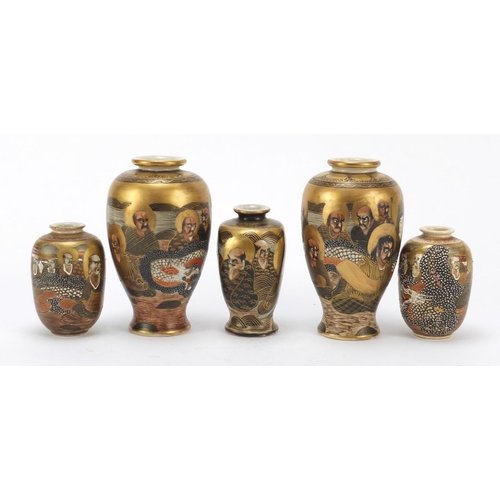 440 - Two pairs of Satsuma pottery vases and one other, each hand painted with one thousand faces, each wi... 