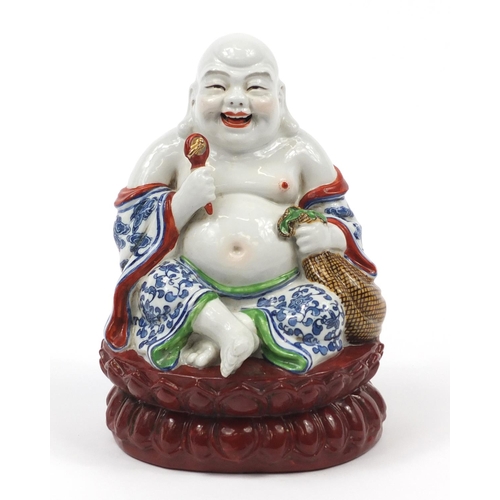 2015 - Chinese porcelain figure of seated Buddha, impressed character marks to the base, 21cm high