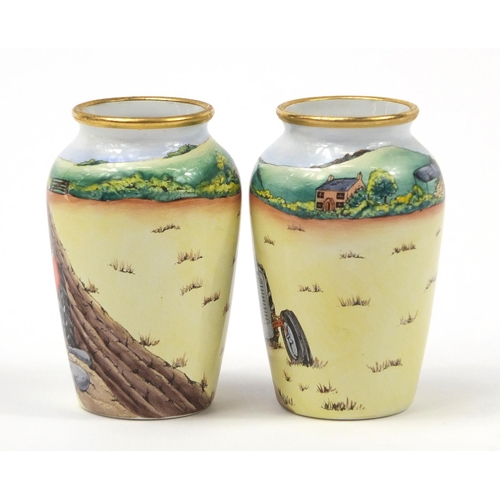 188 - Pair of Moorcroft enamel vases decorated with tractors, each limited edition 27/75, each 7cm high