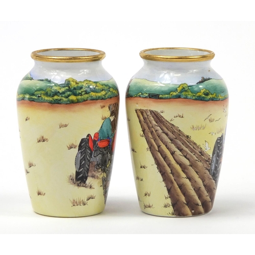 188 - Pair of Moorcroft enamel vases decorated with tractors, each limited edition 27/75, each 7cm high