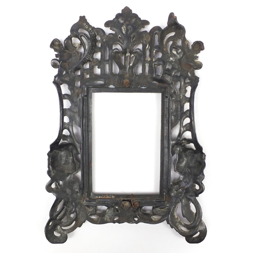 99 - Art Nouveau bronze photo frame embossed with maidenheads, 36cm high