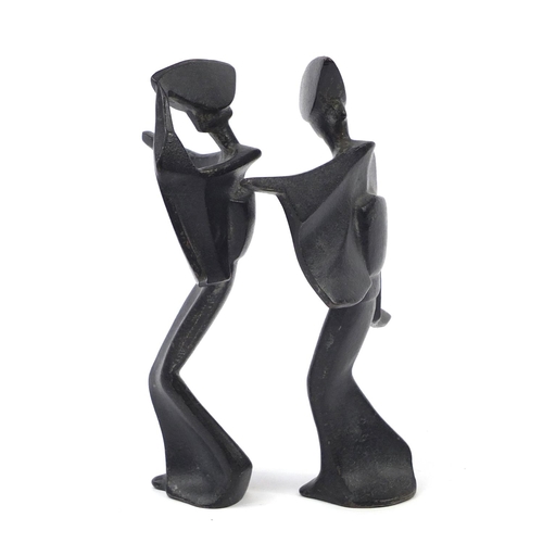 96 - Pair of Japanese Modernist iron figures, the largest 18cm high