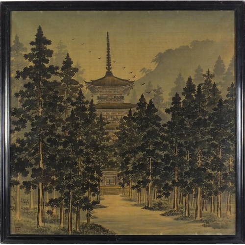 780 - Japanese textile depicting a pagoda through trees with red seal marks, framed and glazed, 57.5cm x 5... 