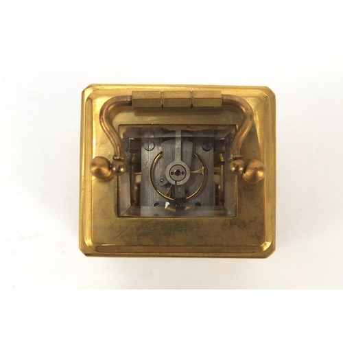 409 - Miniature gilt brass cased carriage clock with Roman and Arabic numerals, 6cm high