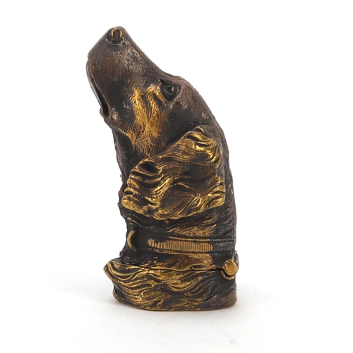 413 - Novelty brass vesta in the form of a dog's head, 5cm high