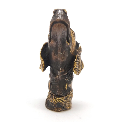 413 - Novelty brass vesta in the form of a dog's head, 5cm high