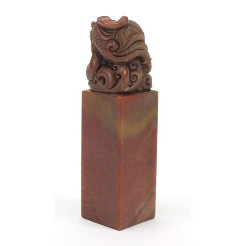 587 - Chinese soapstone seal carved with a dragon, character marks to the base, 12cm high