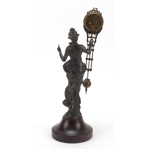 193 - Patinated bronzed mystery clock in the form of an Art Nouveau female, 33.5cm high