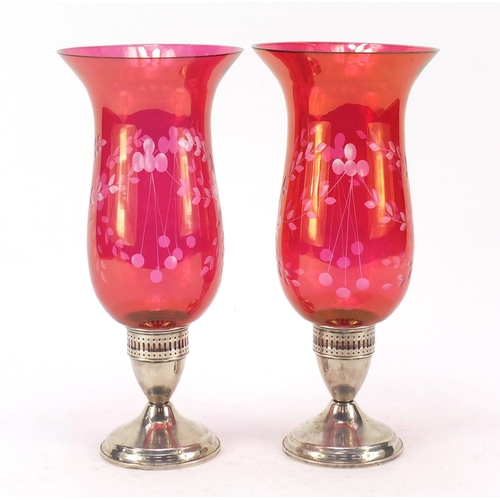 49 - Duchin Creation, pair of sterling silver candleholders with etched cranberry glass shades, each 27.5... 
