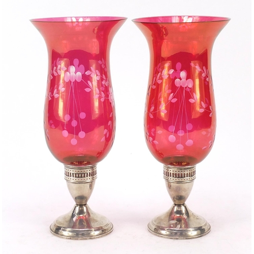 49 - Duchin Creation, pair of sterling silver candleholders with etched cranberry glass shades, each 27.5... 