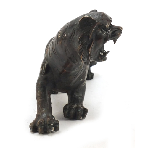 290 - Large Japanese patinated bronze tiger, 31cm in length