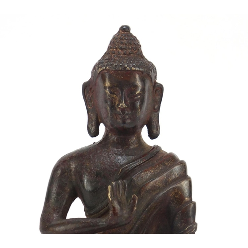 225 - Chino-Tibetan patinated bronze figure of Buddha, 16cm high