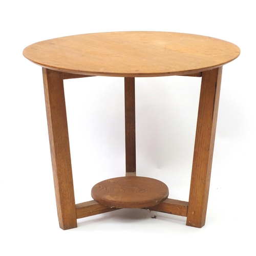 1394 - Art Deco circular oak occasional table with under tier, 48cm high x 59cm in diameter