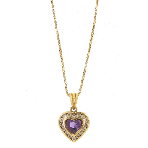 605 - 14ct gold amethyst and clear stone love heart pendant, 2cm in length on an unmarked gold coloured me... 