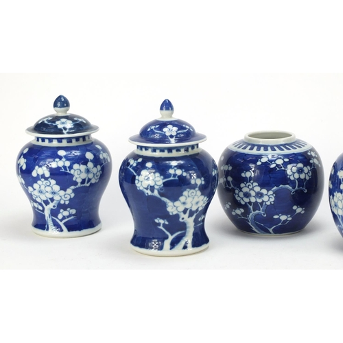 709 - Four Chinese blue and white porcelain ginger jars and a pair of baluster vases with covers, each han... 