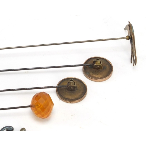 155 - Early 20th century an later hat pins including a silver pair of treble clef form by Charles Horner a... 