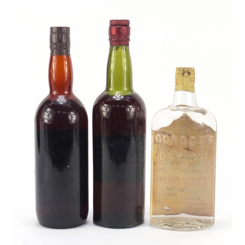 173 - Vintage bottle of Gordon's Gin and two bottles of rum including Fine Old Rum bottled by John Gardner