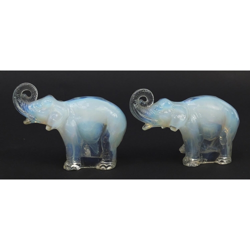 10 - Jobling, Pair of Art Deco opalescent glass elephants, registered number 795191, each 14.5cm in lengt... 