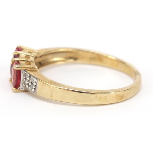 319 - 9ct gold red stone and diamond ring, size O, 2.4g