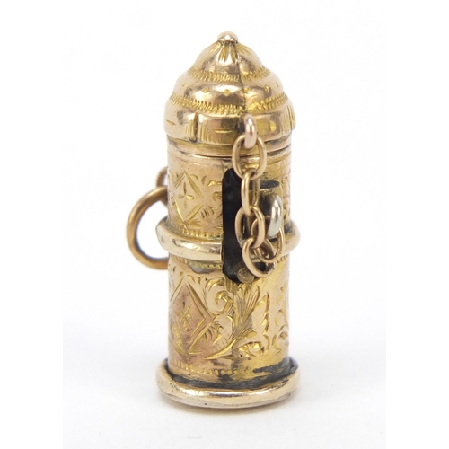 316 - 9ct gold jack in the box design charm with sprung loaded figure, 2.2cm high, 2.5g