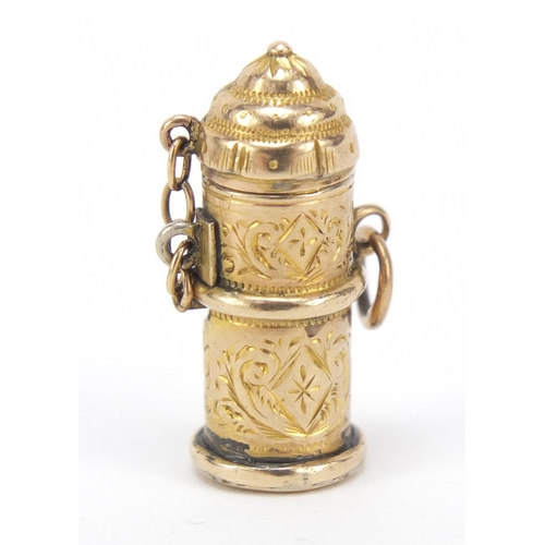 316 - 9ct gold jack in the box design charm with sprung loaded figure, 2.2cm high, 2.5g