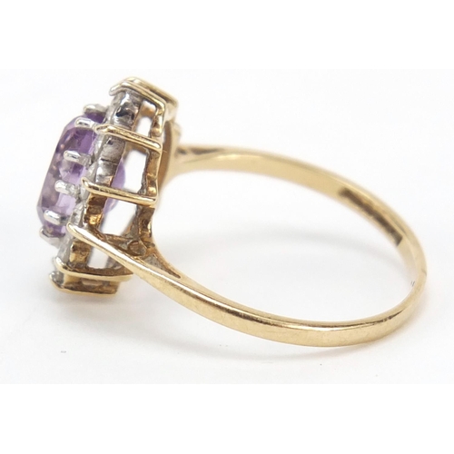 206 - 9ct gold amethyst and cubic zirconia ring, size M, 1.9g