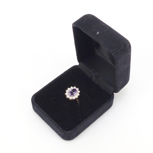 206 - 9ct gold amethyst and cubic zirconia ring, size M, 1.9g