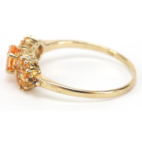 397 - 9ct gold orange stone cluster ring, size U, 2.6g