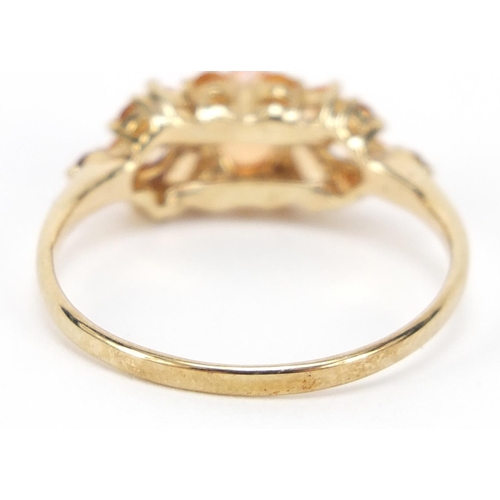 397 - 9ct gold orange stone cluster ring, size U, 2.6g