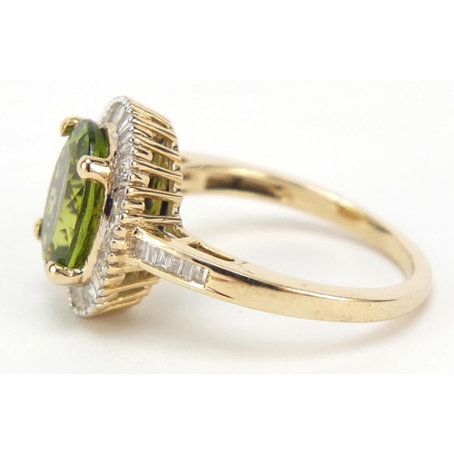 473 - 9ct gold peridot and baguette cut diamond ring, size O, 4.2g