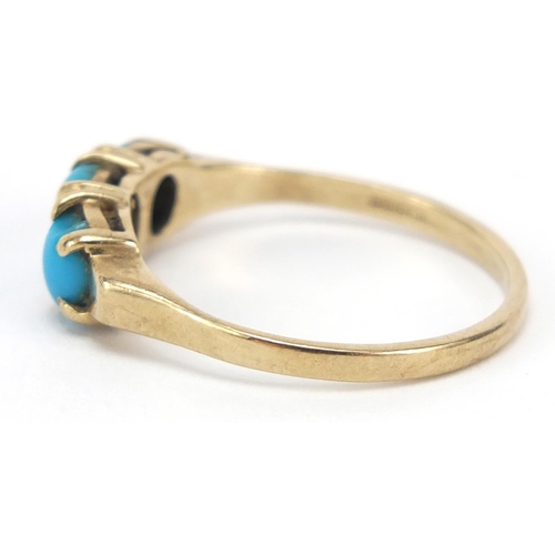 562 - 9ct gold turquoise three stone ring, size O, 2.0g