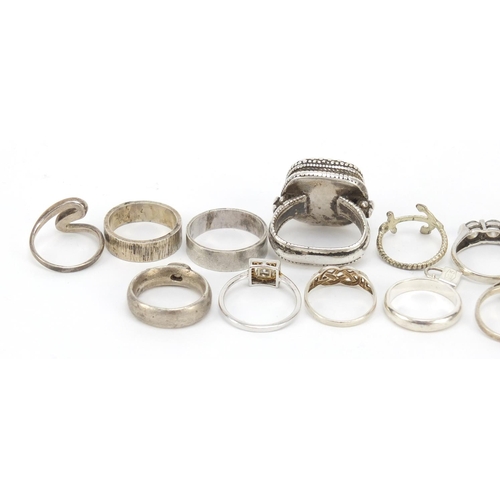 402 - Seventeen silver and white metal rings, some set with semi precious stones, 91.0g