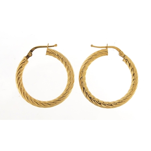 247 - Pair of 9ct gold hoop earrings, 2.5cm in diameter, 1.8g