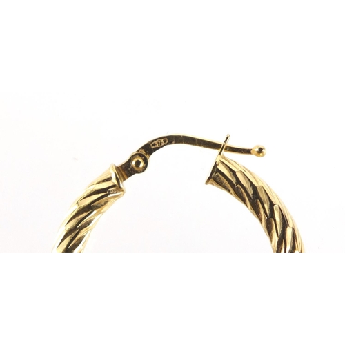 247 - Pair of 9ct gold hoop earrings, 2.5cm in diameter, 1.8g