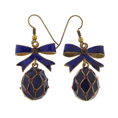72 - Pair of Russian silver gilt and enamel egg and bow design earrings, 5cm in length, 17.0g