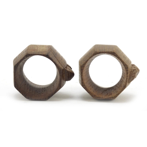 3 - Robert Mouseman Thompson pair of octagonal adzed oak napkin rings, each carved with a signature mous... 