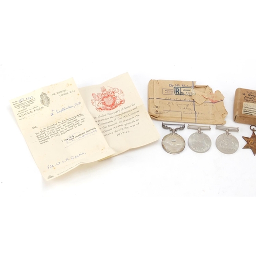 645 - British Military World War II four medal group with two boxes of issue including George VI RAF Long ... 