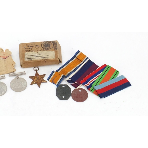 645 - British Military World War II four medal group with two boxes of issue including George VI RAF Long ... 